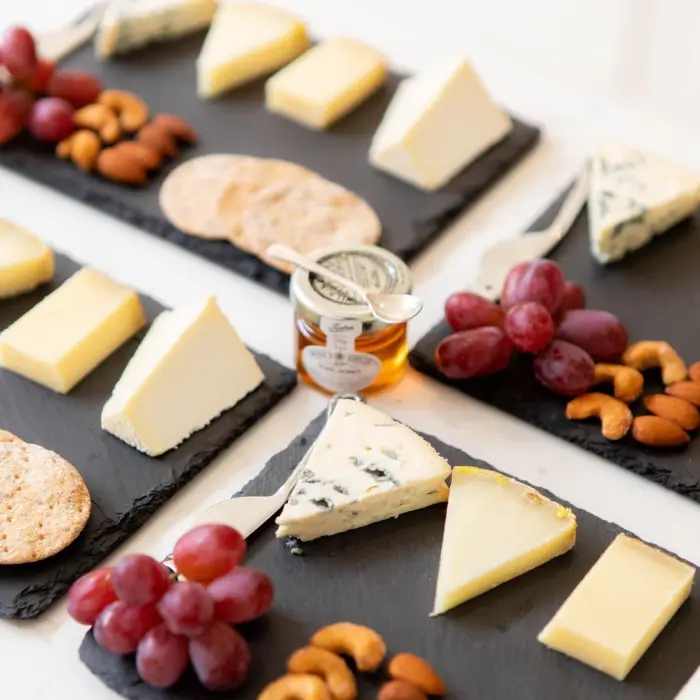 Platter of cheese with honey